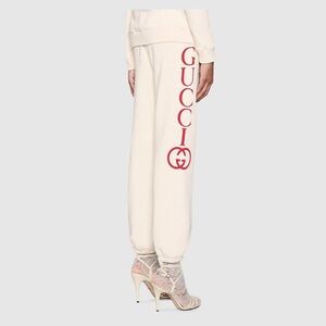 Gucci Women's Off-White Joggers with Bold Red Logo